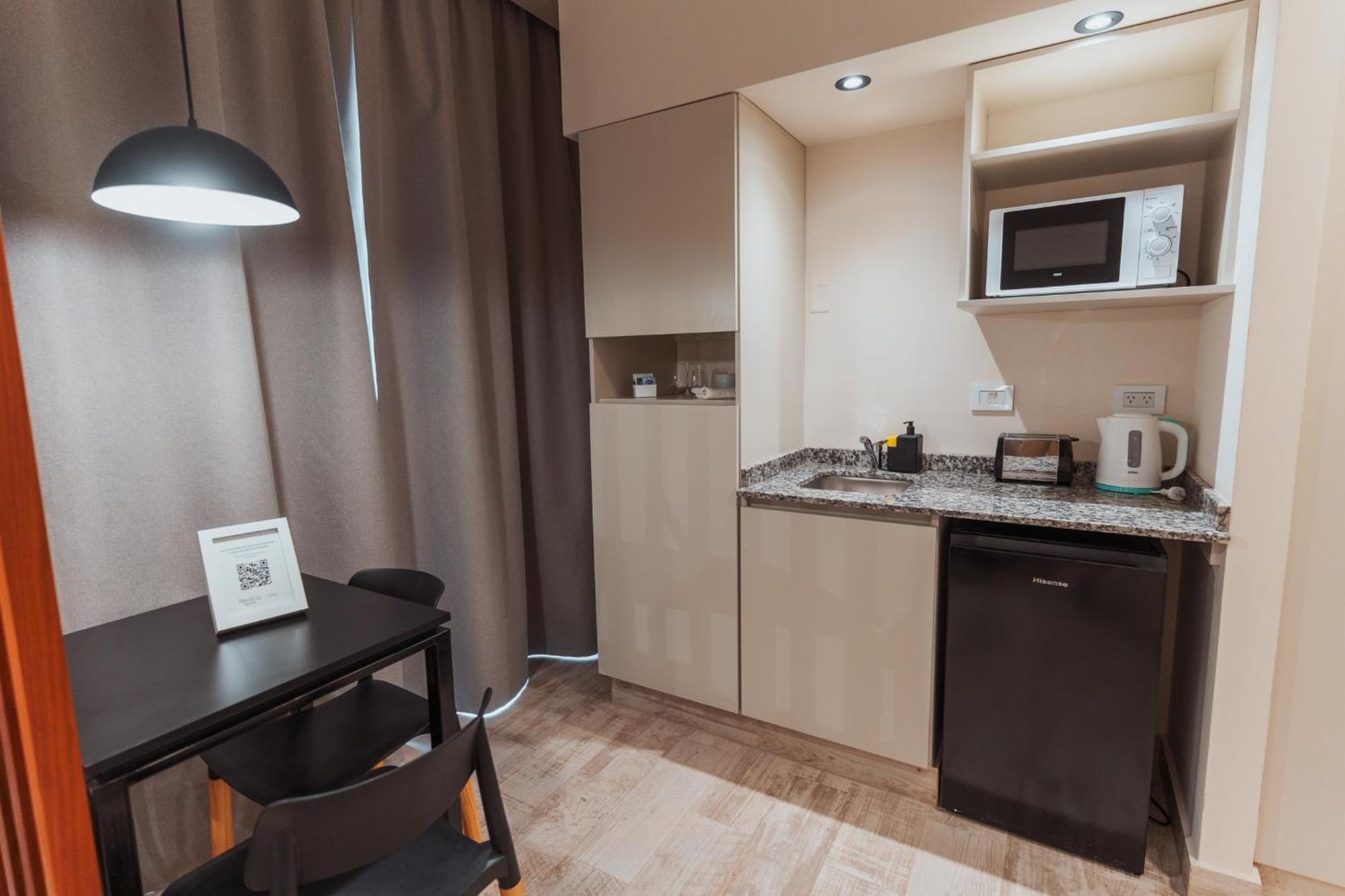 Rentup Suites Сальта Экстерьер фото